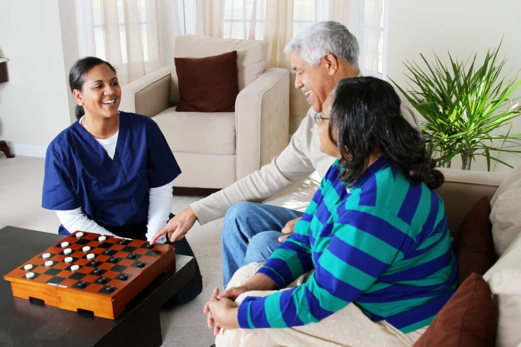 Home care cost in Philadelphia with a caregiver assisting a senior at home